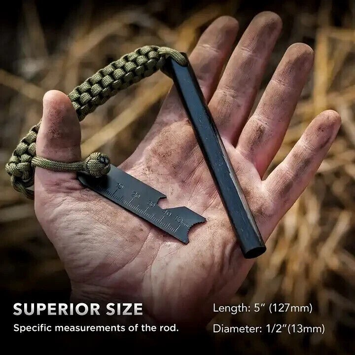 Large ferro rod and striker in a dirty hand